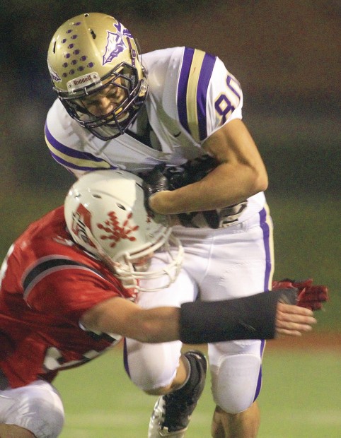 Muscatine vs. Assumption